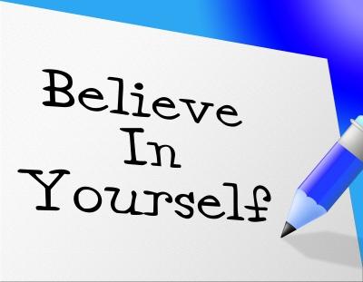 believe in yourself with pen on paper